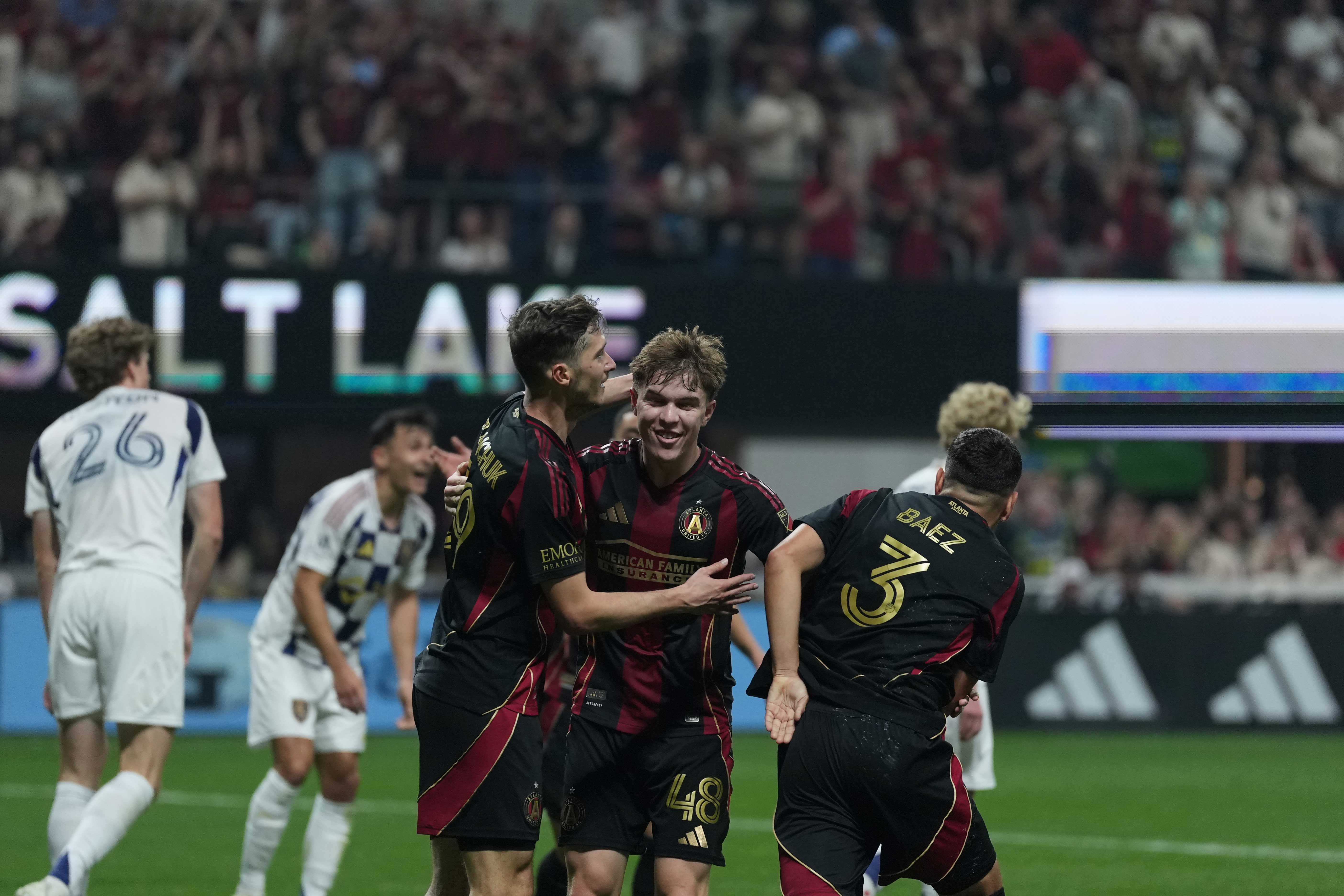 Atlanta United players Alexey Miranchuk, Cooper Sanchez, and Elias Baez
